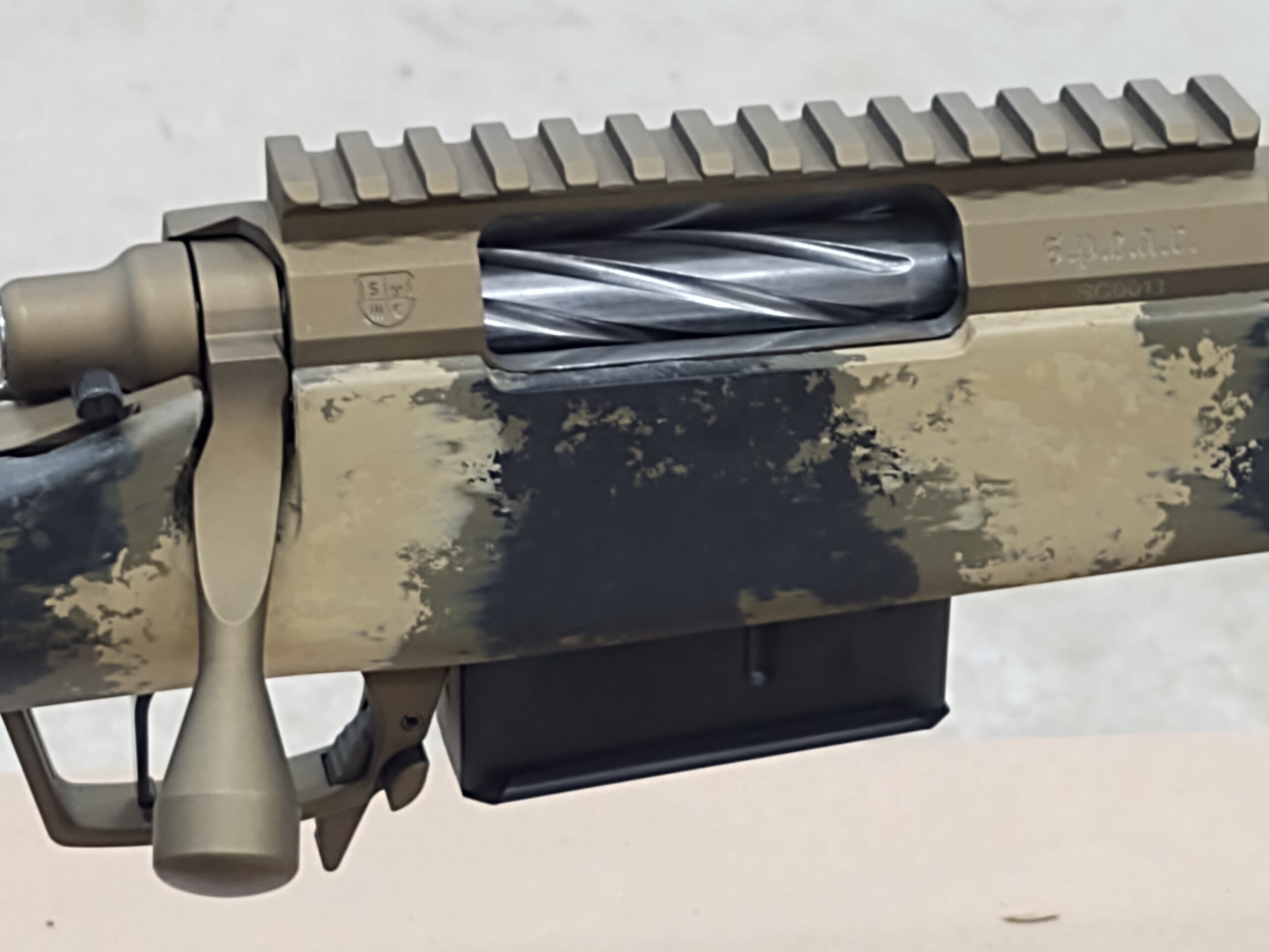 SPEAR build fluted bolt and shield logo detail